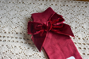 Burgundy knee highs with matching velvet bow