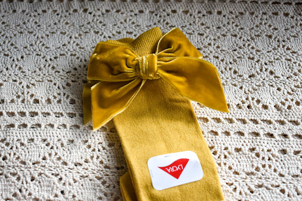 Mustard knee highs with matching velvet bow