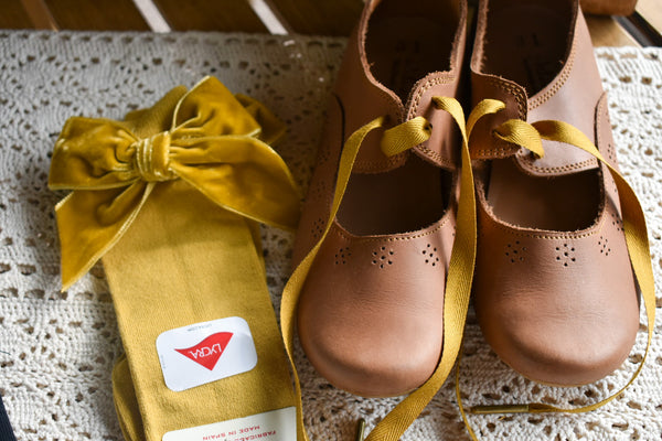 Mustard knee highs with matching velvet bow